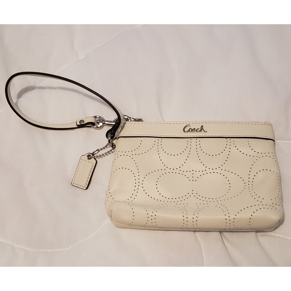 Coach ivory perforated leather wristlet
